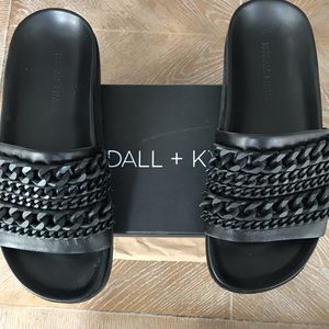 Kendall and Kylie slip ons black